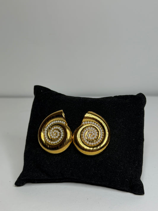 Elegant snail-shaped earrings adorned with delicate pearls.